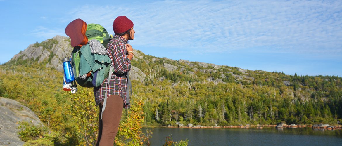 Student at top of Tumbledown Mountain