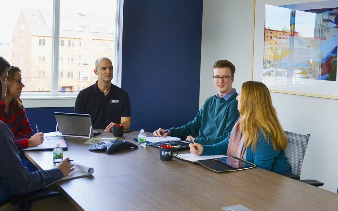 Early this spring, Daniel Mickiewicz, (second from right) UMF Actuarial Science student intern, learned more about EPIC Retirement Plan Services and its internship opportunities from Matt Pine, (center) director of retirement plan consulting, and other EPIC employees.(from left) Justin Toporcer, Kelsey Alley and Ingrid Libby.