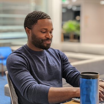 Student working at a laptop
